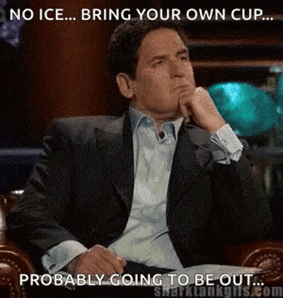 Man In Suit With Hand On Chin Shark Tank Meme GIF