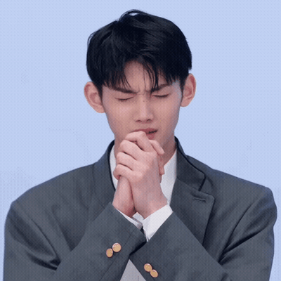 Man In Suit With Hands Folded GIF