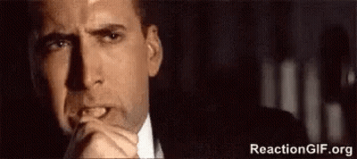 Man In Suit With Hands Folded GIF