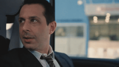Man In Suit With Lanyard Saying County Affairs GIF