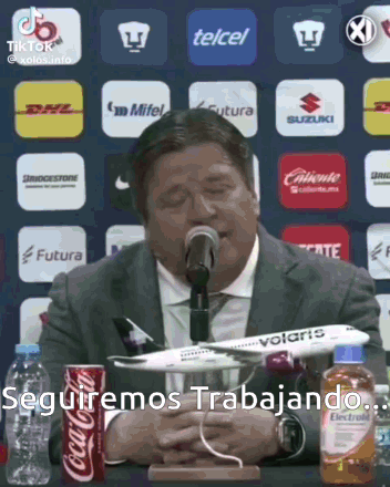 Man In Suit With Microphone Airplane And Coke GIF
