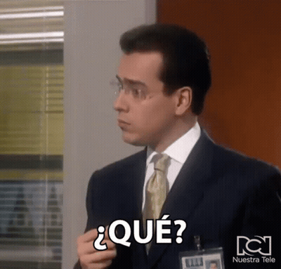 Man In Suit With Nuestra Tele Name Tag GIF