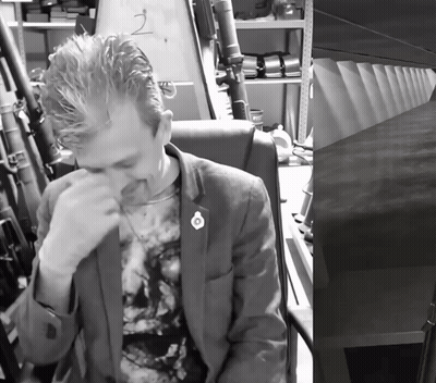 Man In Suit With Number 2 GIF
