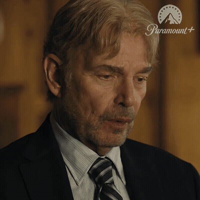 Man In Suit With Paramount Logo On Forehead GIF