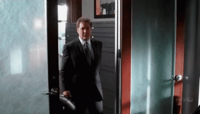 Man In Suit With Pin Saying EC GIF