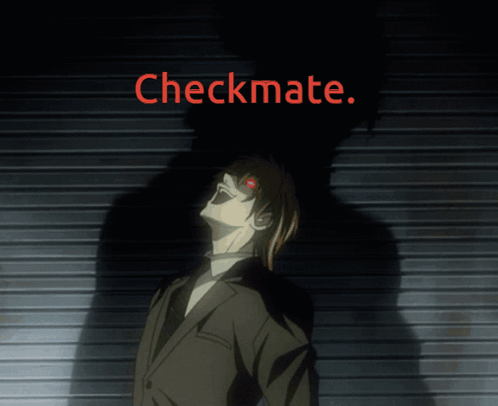 Man In Suit With Red Eyes Checkmate Sign GIF