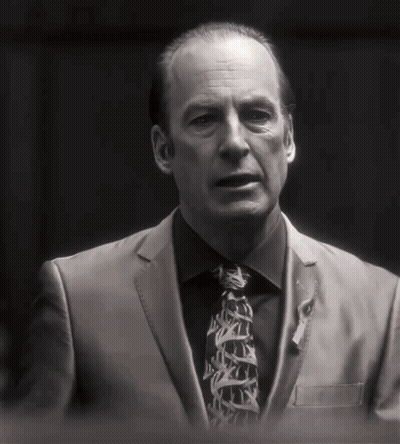 Man In Suit With Ribbon GIF
