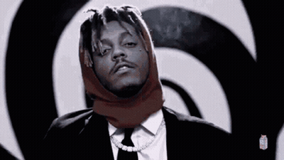Man In Suit With Scarf On Head GIF