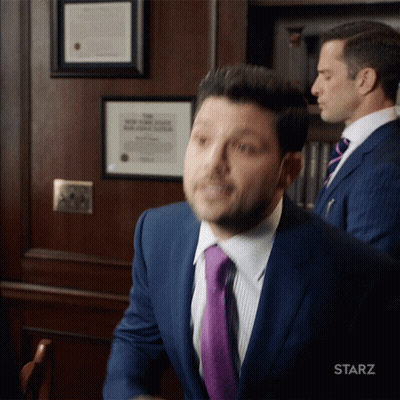 Man In Suit With Starz Logo GIF