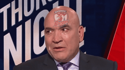 Man In Suit With Sydney Roosters Logo On Head GIF