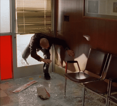Man In Suit With Turkey On Head And Maple Leafs Jersey GIF