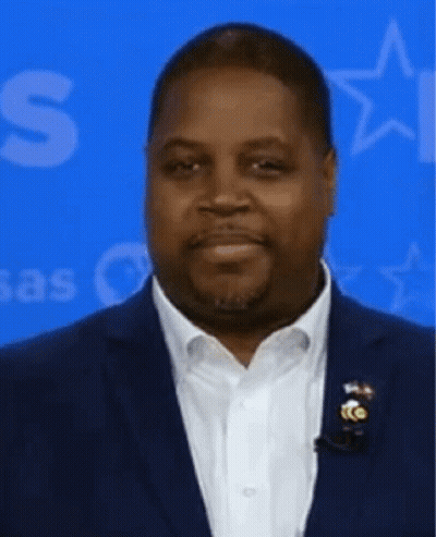 Man In Suit With White Shirt And Blue Star Background GIF