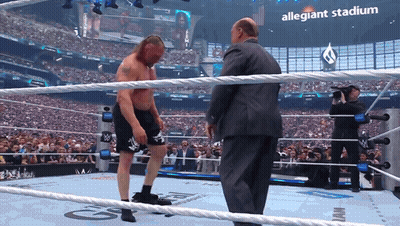 Man In Suit Wrestling Ring Allegiant Stadium Sign GIF