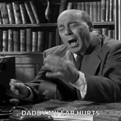 Man In Suit Yelling At Desk GIF