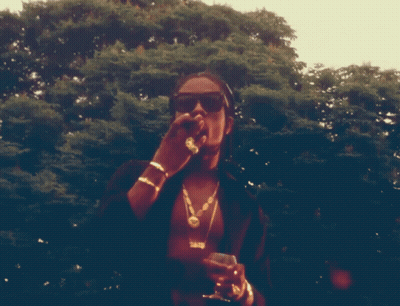 Man In Sunglasses And 2010 Necklace GIF
