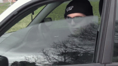 Man In Sunglasses And Beanie Saying Chicago GIF