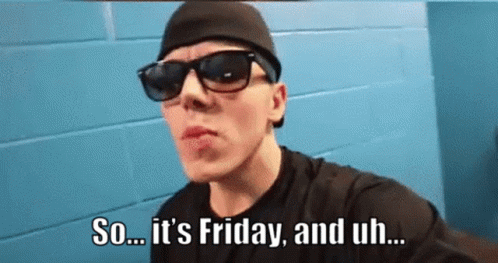 Man In Sunglasses And Beanie Saying It's Friday GIF