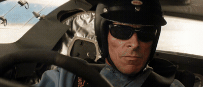 Man In Sunglasses And Bell Helmet Sitting In Car GIF
