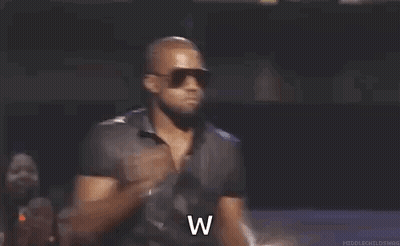 Man In Sunglasses And Black Shirt At Microphone GIF
