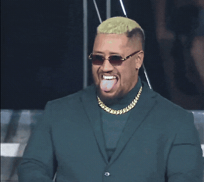 Man In Sunglasses And Blue Jacket Holding Microphone GIF