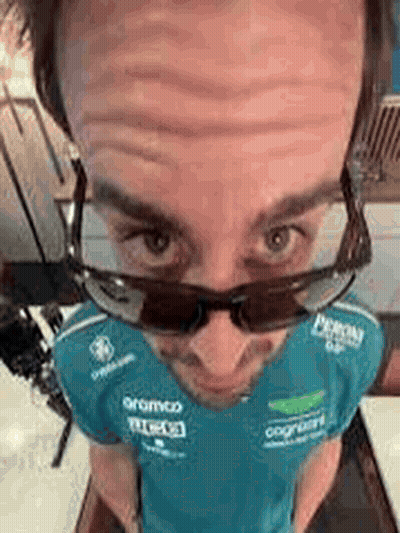 Man In Sunglasses And Blue Shirt Taking Selfie GIF