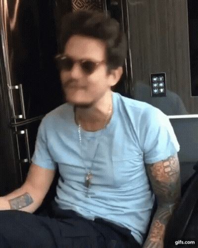 Man in Sunglasses and Blue Shirt