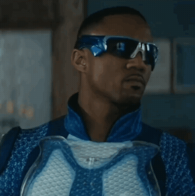 Man In Sunglasses And Blue White Costume GIF
