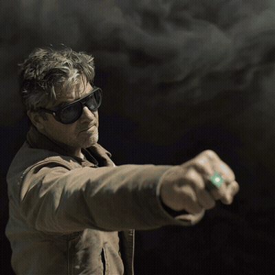 Man In Sunglasses And Brown Jacket Holding Something GIF