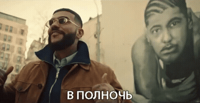Man In Sunglasses And Brown Jacket In Front Of Painting GIF