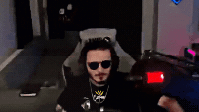 Man In Sunglasses And Calm Shirt Sitting In Chair GIF