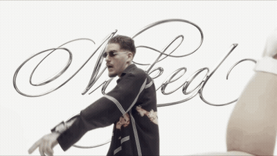Man In Sunglasses And Chain Pointing At Head GIF