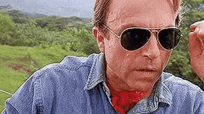 Man In Sunglasses And Denim Shirt In Field GIF