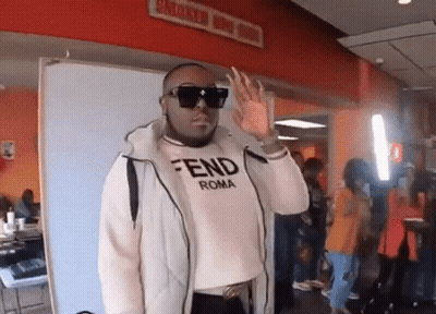 Man In Sunglasses And Fendi Roma Shirt Waving Hand GIF
