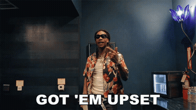 Man In Sunglasses And Floral Shirt Saying Got Em Upset GIF