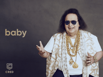 Man In Sunglasses And Gold Necklace With Baby Sign GIF