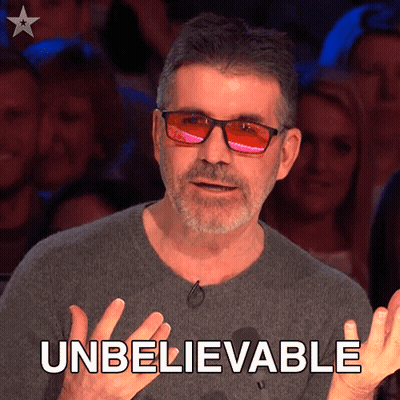 Man In Sunglasses And Gray Shirt Says Unbelievable GIF