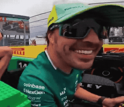 Man In Sunglasses And Green Coinbase Shirt GIF