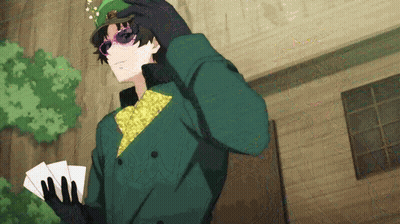 Man In Sunglasses And Green Hat Holding Cards GIF