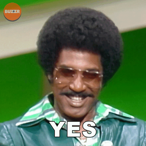 Man In Sunglasses And Green Jacket Smiling With Yes GIF