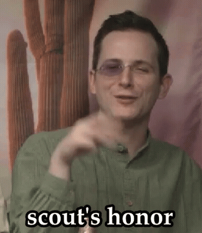 Man In Sunglasses And Green Shirt Giving Peace Sign Scout's Honor GIF