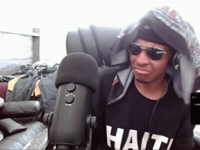 Man In Sunglasses And Haiti Shirt GIF