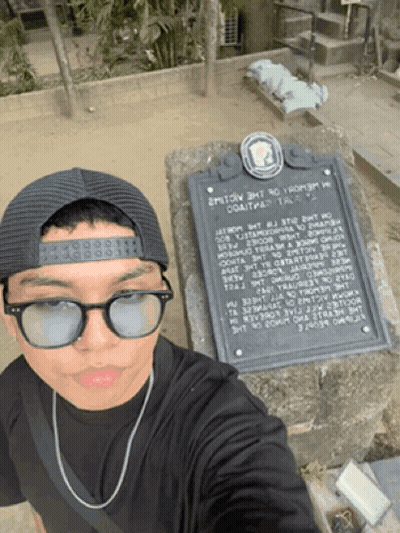 Man In Sunglasses And Hat At Historical Monument GIF