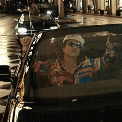 Man In Sunglasses And Hat Saying Supreme Driving Car GIF