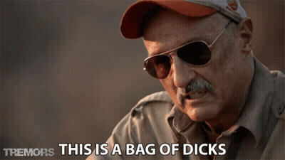 Man In Sunglasses And Hat Saying Tremors This Is A Bag Of Dicks GIF