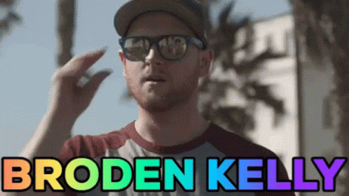 Man In Sunglasses And Hat With Name Broden Kelly GIF