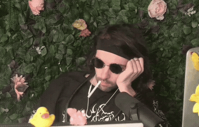 Man In Sunglasses And Headband Smoking Cigarette GIF