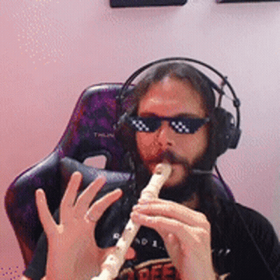 Man In Sunglasses And Headphones Playing Flute GIF