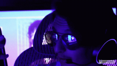 Man In Sunglasses And Headset Looking At Computer With Karwing GIF
