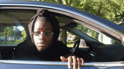 Man In Sunglasses And Hoodie Sitting In Car GIF