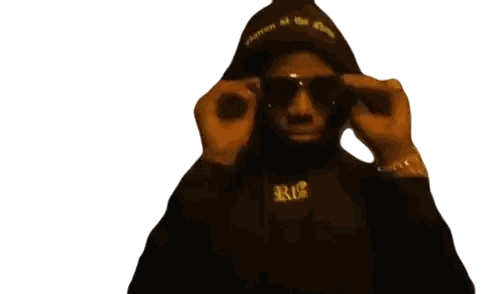 Man In Sunglasses And Hoodie With R Sticker